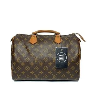 LOUIS VUITTON • SPEEDY 30 BAG